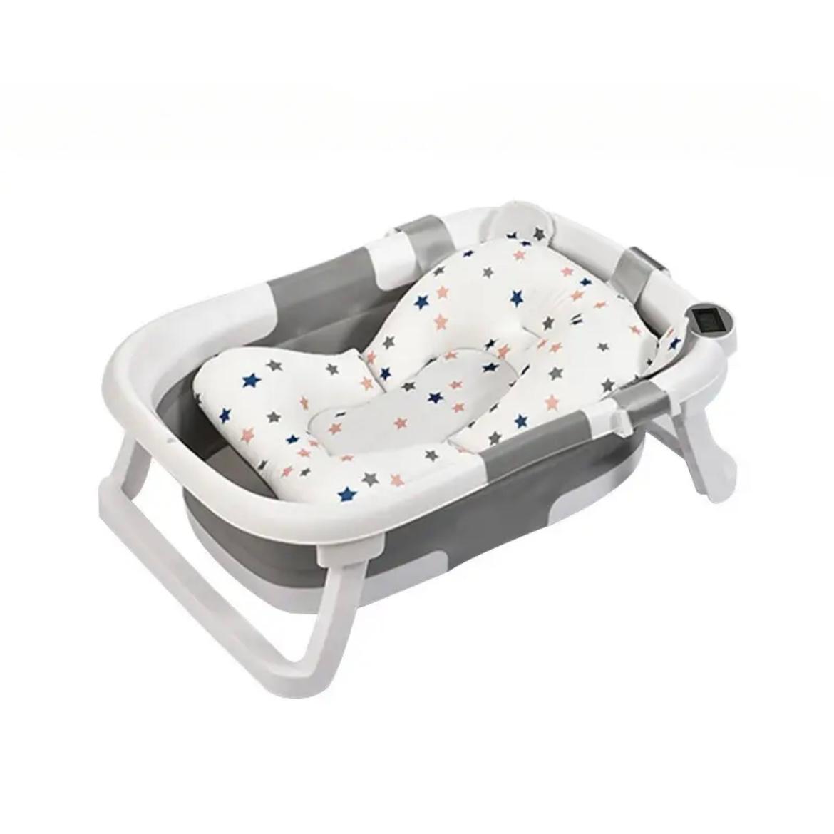 Baignoire pliable pour bébé avec coussin antidérapant et thermomètre intégré.