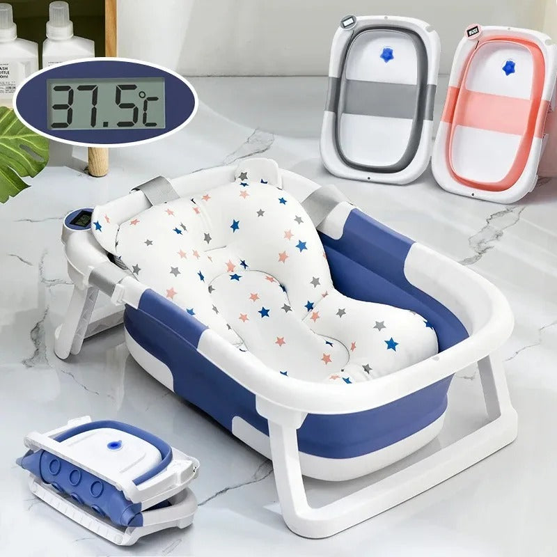 Baignoire pliable pour bébé avec coussin antidérapant et thermomètre intégré.